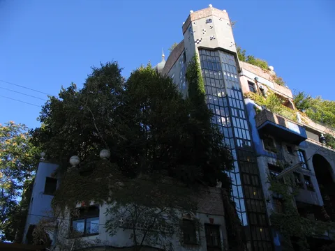 Upper facade and greenery of Hundertwasserhaus Vienna