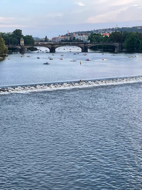 Boats and a bridge on the Vltava in Prague